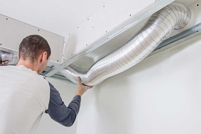 Servicing ventilation duct.